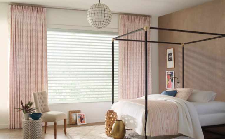 light filtering panels and drapery in pink bedroom